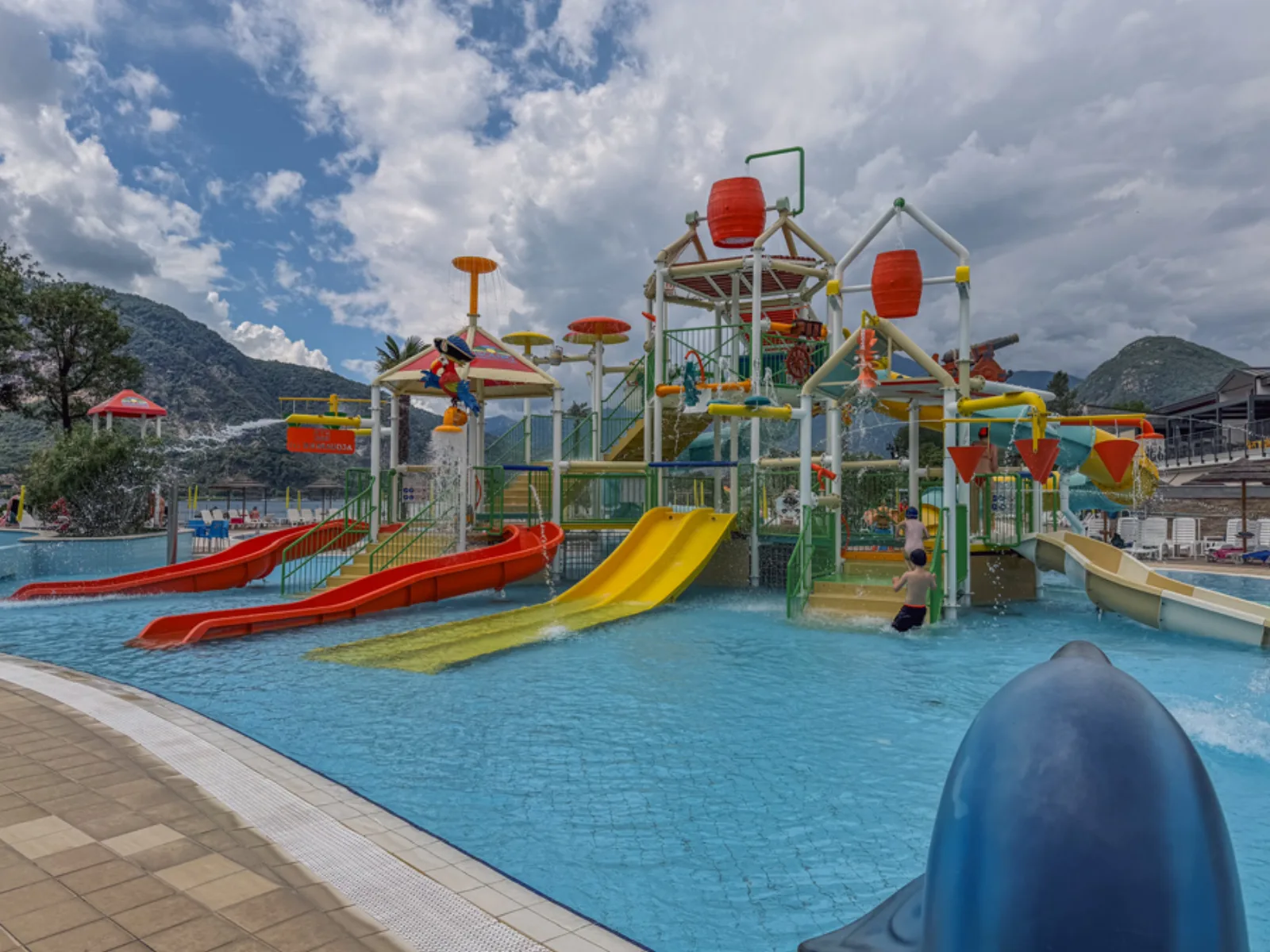 Colourful water park with slides at Camping Village Isolino