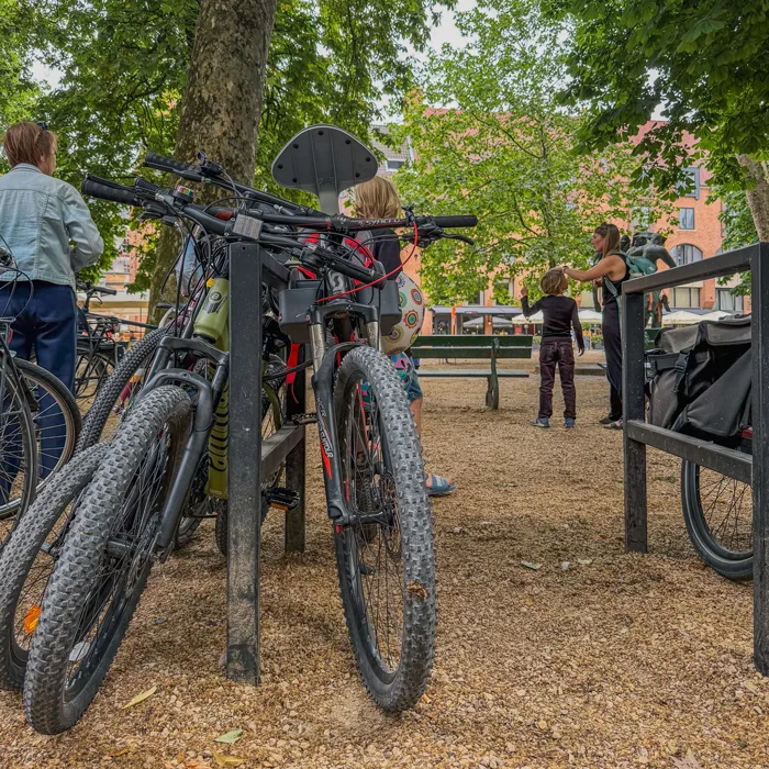 Bikes locked up under the trees while exploring on foot