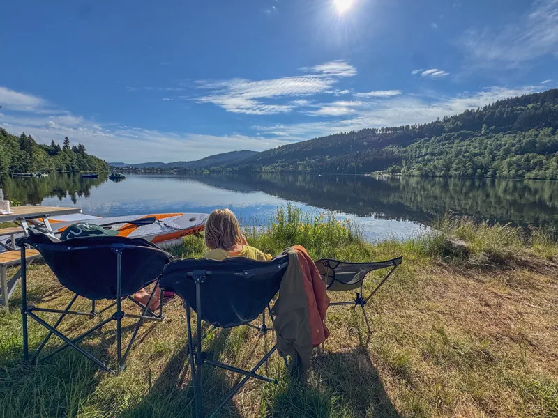 Sitting out in camping chairs beside Lake Titisee