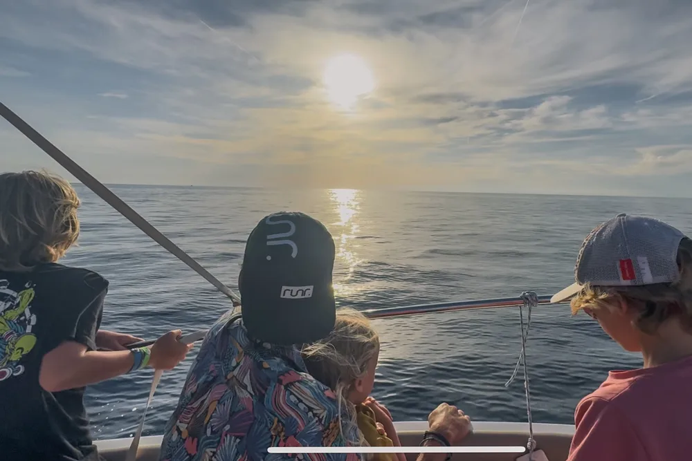 Watching the sun set from our private dolphin-watching boat off the Croatian coast