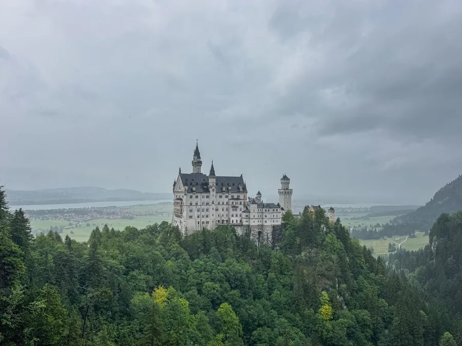 Neuschwanstein Castle under moody grey skies